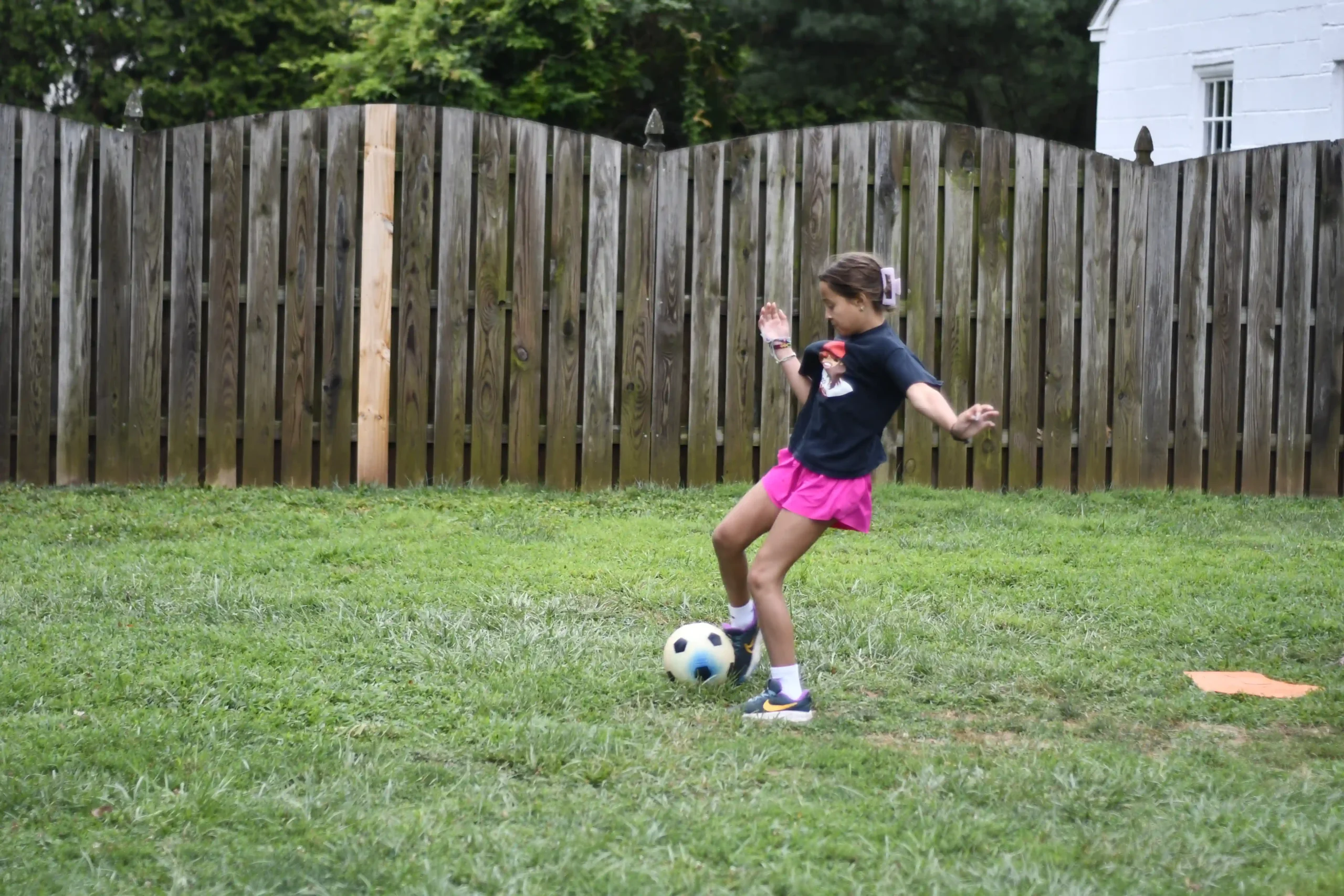 kid-kicking-soccer-ball